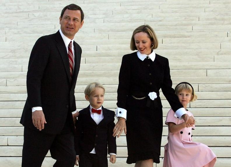 Image of a successful lawyer, John Roberts and his family