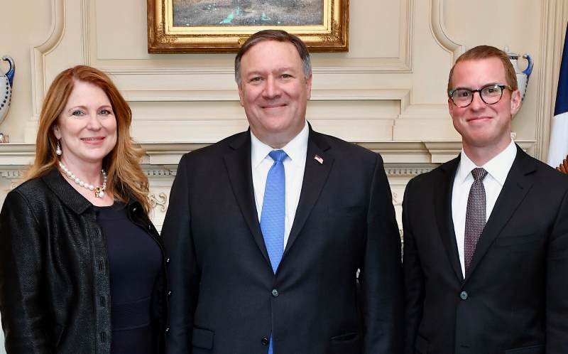 Image of the former first lady of the CIA, Susan Pompeo and her husband and son